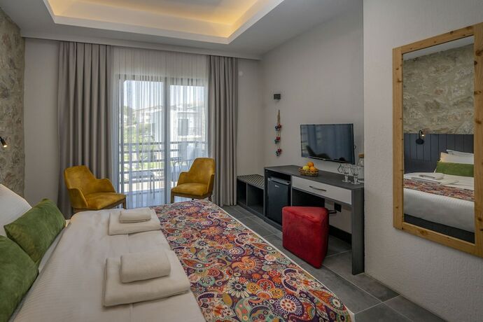 Imagen de la habitación del Dadya Bora Hotel. Foto 17