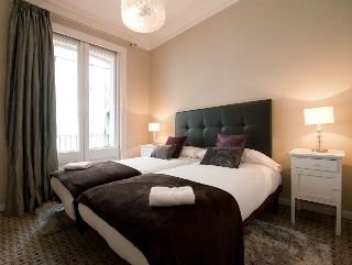 Imagen de la habitación del Dailyflats Modern Ramblas. Foto 4