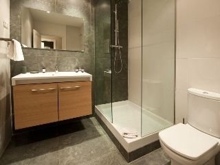 Imagen de la habitación del Dailyflats Modern Ramblas. Foto 7