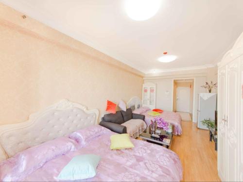 Imagen de la habitación del Dalian Aegean Sea Apartment. Foto 9