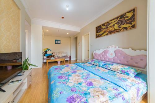 Imagen de la habitación del Dalian Aegean Sea Apartment. Foto 10