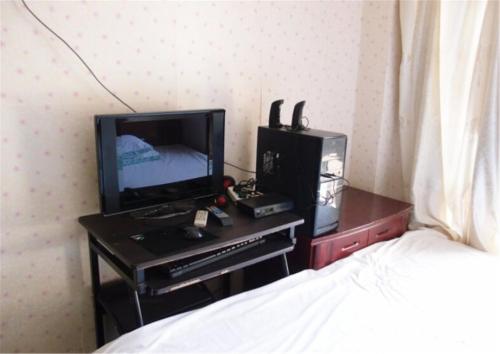 Imagen de la habitación del Dalian Binyue Inn. Foto 4