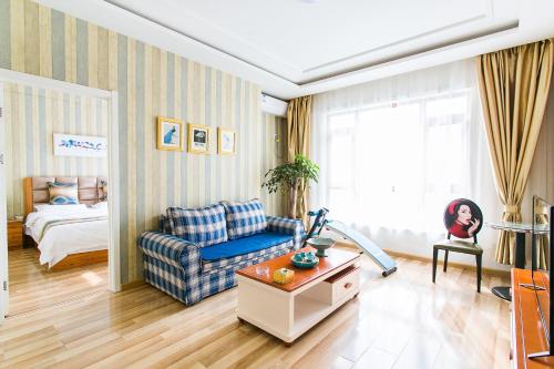 Imagen de la habitación del Dalian Bo Ke Business Apartment. Foto 7