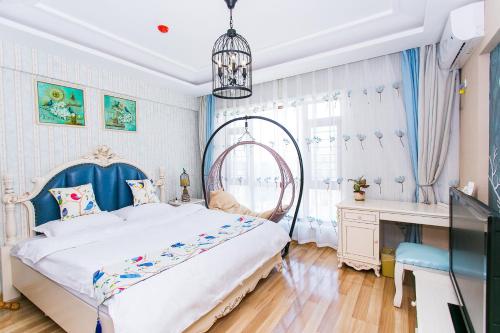 Imagen de la habitación del Dalian Bo Ke Business Apartment. Foto 8
