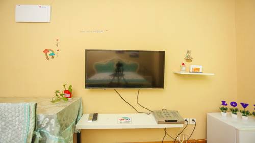 Imagen de la habitación del Dalian Hong Xi Yuan Apartment Wanda Plaza. Foto 2