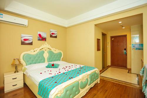 Imagen de la habitación del Dalian Hong Xi Yuan Apartment Wanda Plaza. Foto 4