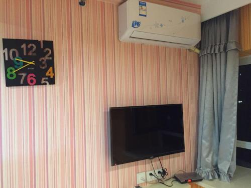 Imagen de la habitación del Dalian Sweet Home Inn. Foto 5