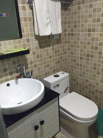 Imagen de la habitación del Dalian Sweet Home Inn. Foto 6