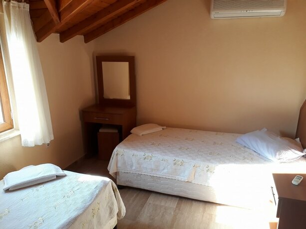 Imagen de la habitación del Dalyan Villa Kiydan Apartments. Foto 19