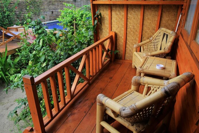 Imagen de la habitación del Damai Bungalows. Foto 19