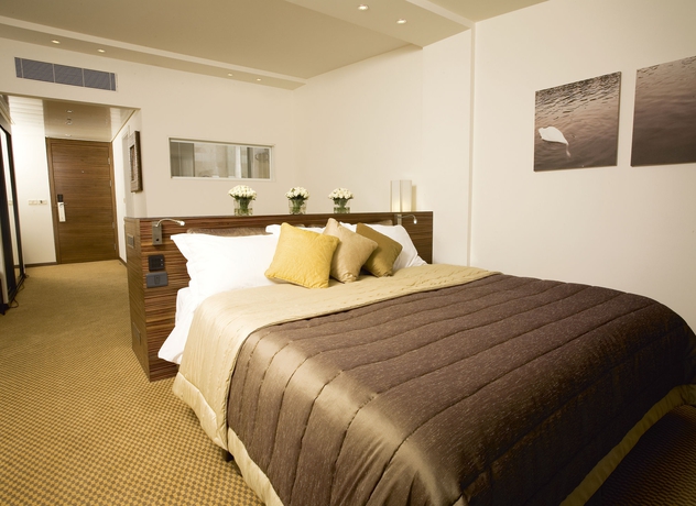 Imagen de la habitación del Dan Accadia Hotel. Foto 13