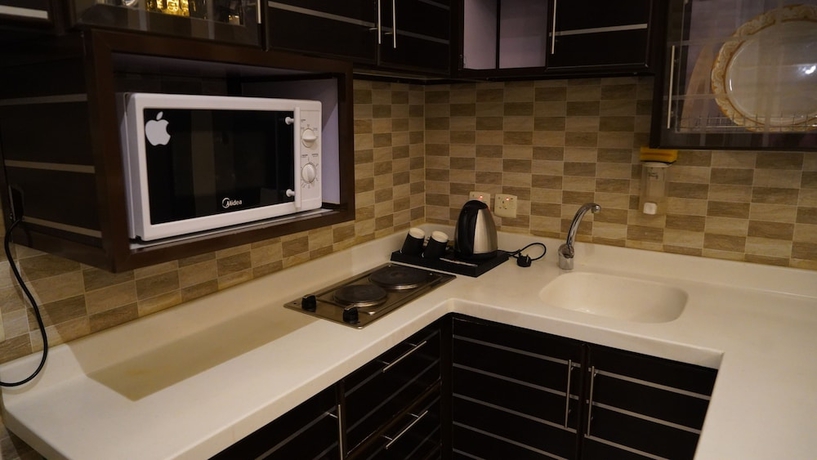 Imagen de la habitación del Dana Hotel Suites. Foto 7