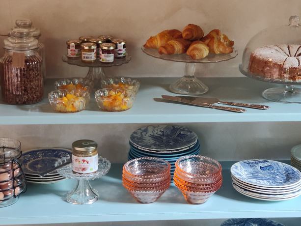 Imagen del bar/restaurante del Dandelion Como Suites and Park. Foto 3