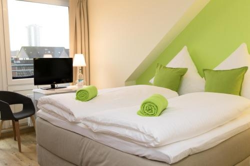 Imagen de la habitación del Das Fr&uuml;hst&uuml;ckshotel B&uuml;sum. Foto 6