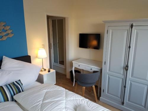Imagen de la habitación del Das Fr&uuml;hst&uuml;ckshotel B&uuml;sum. Foto 8