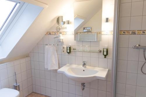 Imagen de la habitación del Das Fr&uuml;hst&uuml;ckshotel B&uuml;sum. Foto 10