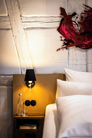 Imagen de la habitación del Das Goldschl&auml;ger Boutique Hotel. Foto 10
