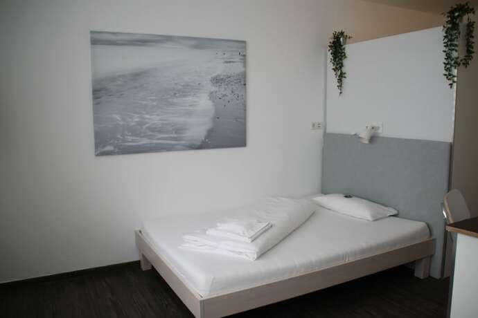 Imagen de la habitación del DasApartmentHaus - Zentrum-F&uuml;rstenplatz. Foto 11