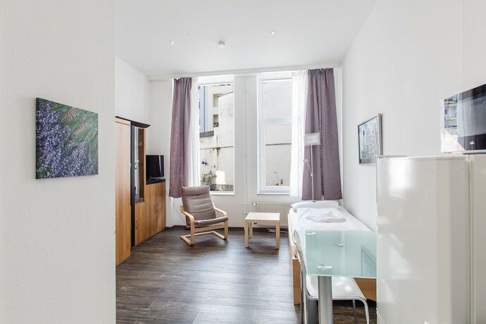 Imagen de la habitación del DasApartmentHaus - Zentrum-F&uuml;rstenplatz. Foto 16