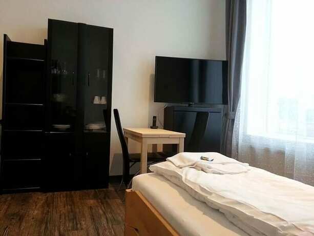 Imagen de la habitación del DasApartmentHaus - Zentrum-F&uuml;rstenplatz. Foto 20