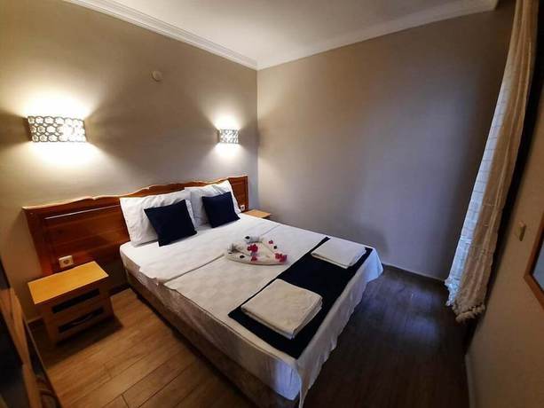 Imagen de la habitación del Dasis Hotel and Suites. Foto 16