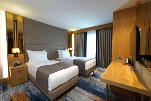 Imagen de la habitación del Days Inn by Wyndham Istanbul Bomonti. Foto 14