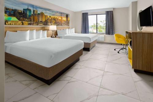Imagen de la habitación del Days Inn by Wyndham Staten Island. Foto 15