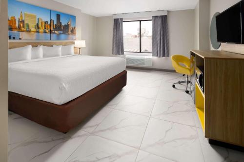 Imagen de la habitación del Days Inn by Wyndham Staten Island. Foto 16