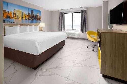 Imagen de la habitación del Days Inn by Wyndham Staten Island. Foto 18