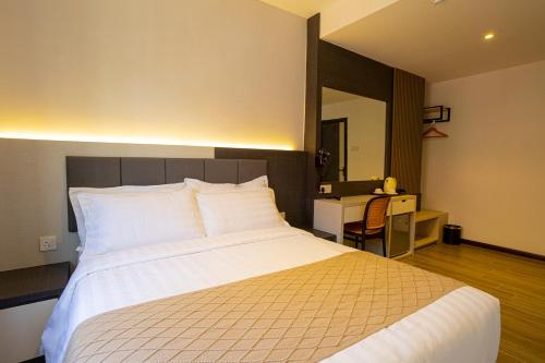 Imagen de la habitación del De Quinton Hotel. Foto 13