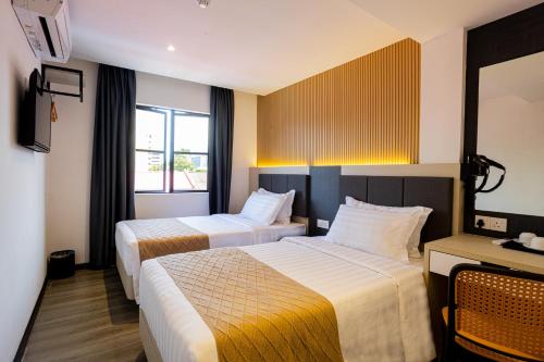 Imagen de la habitación del De Quinton Hotel. Foto 15
