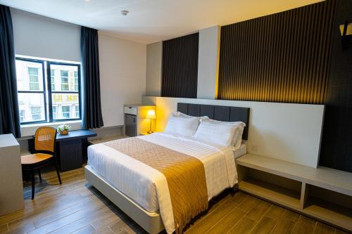 Imagen de la habitación del De Quinton Hotel. Foto 17