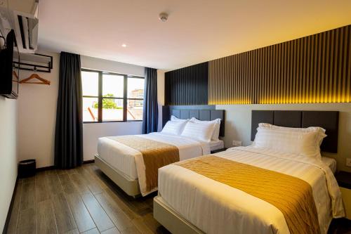 Imagen de la habitación del De Quinton Hotel. Foto 19
