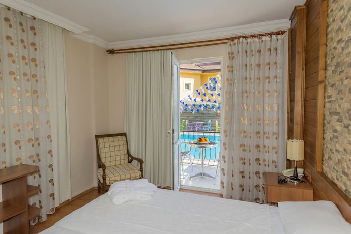 Imagen de la habitación del Dedeminn Garden Hotel, FETHIYE. Foto 5