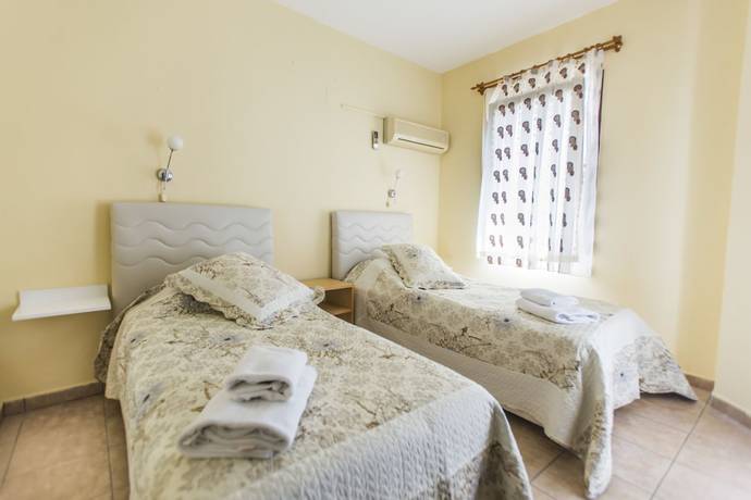 Imagen de la habitación del Dedeminn Garden Hotel, FETHIYE. Foto 12
