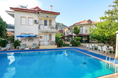 Imagen general del Dedeminn Garden Hotel, G&Ouml;CEK. Foto 8