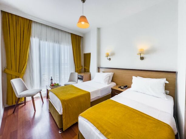 Imagen de la habitación del Dedeoğlu Port Hotel. Foto 12