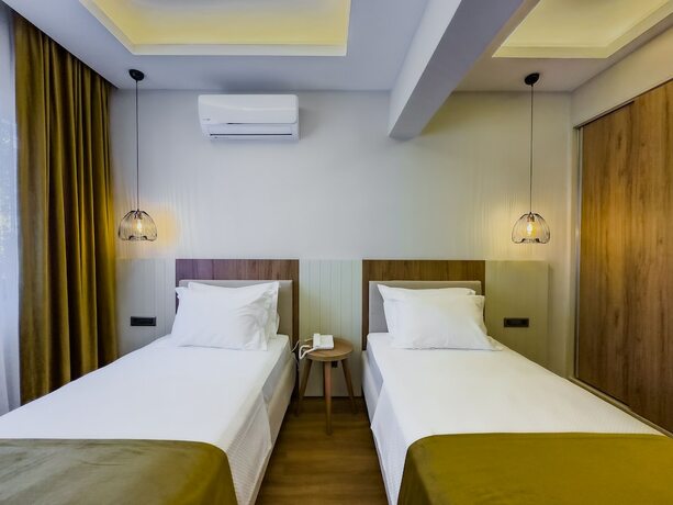 Imagen de la habitación del Dedeoğlu Port Hotel. Foto 15