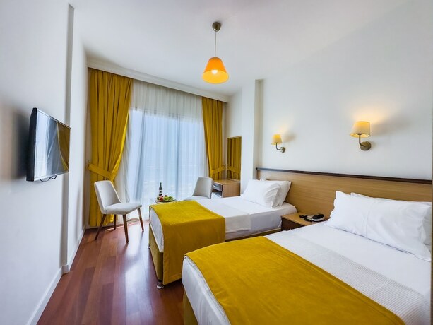 Imagen de la habitación del Dedeoğlu Port Hotel. Foto 17