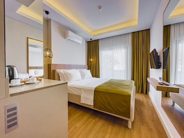 Imagen de la habitación del Dedeoğlu Port Hotel. Foto 18