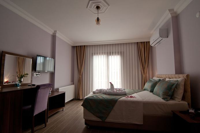 Imagen de la habitación del Defne Hotel. Foto 19