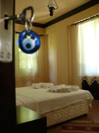 Imagen de la habitación del Defne Pansiyon. Foto 18