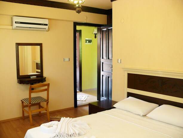 Imagen de la habitación del Defne Pansiyon. Foto 19