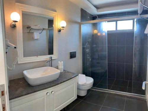 Imagen de la habitación del Defne Seaside Apartments. Foto 17