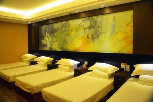 Imagen de la habitación del Dehong Shangshui Spa Hotel. Foto 1