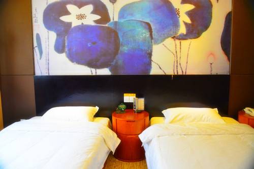 Imagen de la habitación del Dehong Shangshui Spa Hotel. Foto 2