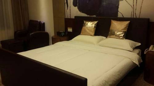 Imagen de la habitación del Dehong Shangshui Spa Hotel. Foto 4