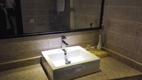 Imagen de la habitación del Dehong Shangshui Spa Hotel. Foto 6