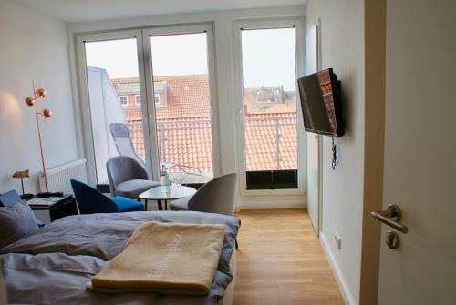 Imagen de la habitación del Deichhotel Rose. Foto 16