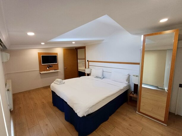 Imagen de la habitación del Del Puerto Hotel. Foto 17